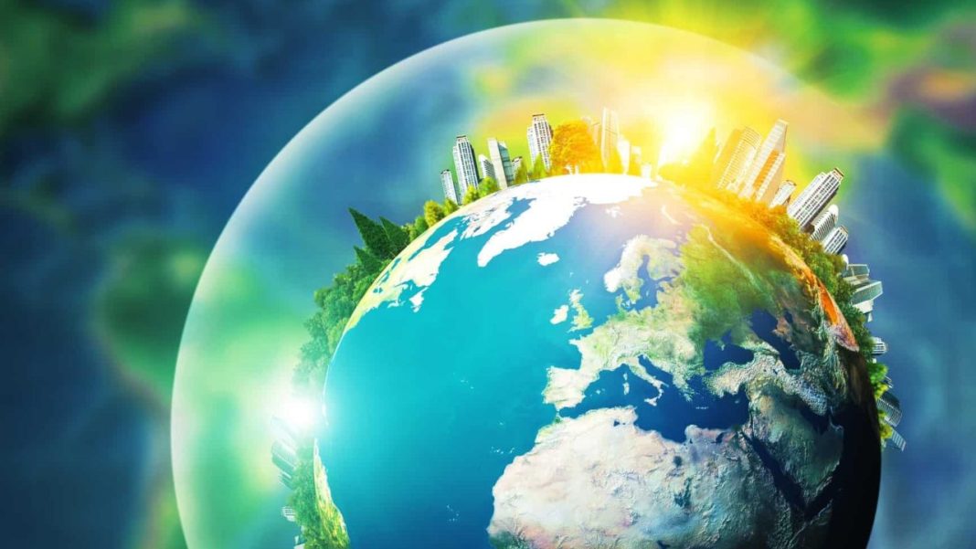 Uma foto da Terra com uma cidade ao fundo, promovendo a sustentabilidade durante a Hora do Planeta.